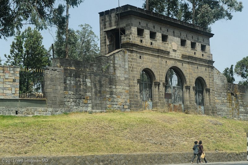 20120327_135319 Nikon D3S 2x3.jpg - This is the Palace surrounded by decorative fencing.   It was where Haile Selassie lived and ruled.   It is now called Jubilee Palace and is the official  residence of the current President.  The Palace is closed to the public and I learned after I took this photo that no photos are allowed of the site.  Plans are currently underway to build a new Palace and this structure will become a museum.